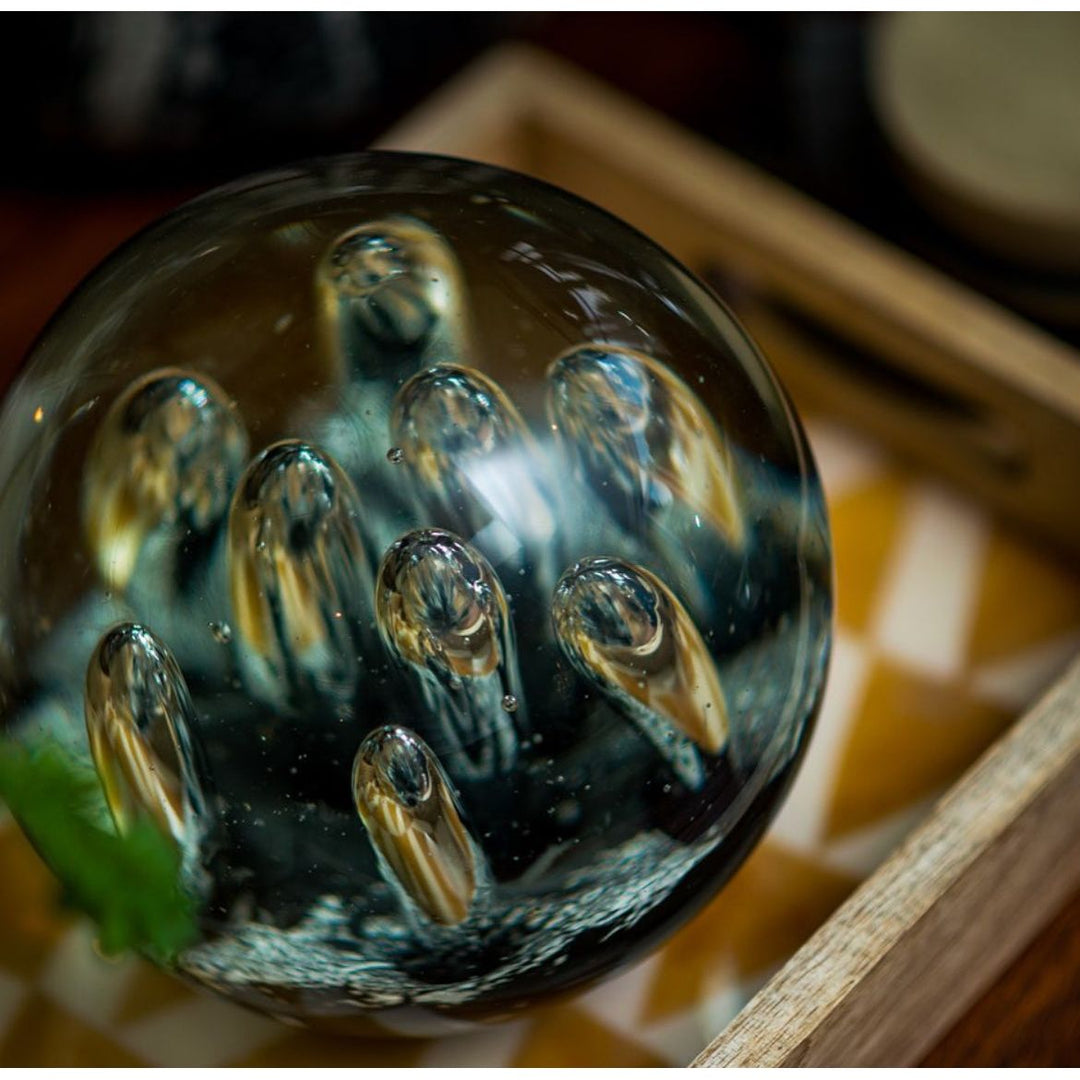 Glass Paperweight with Black Sand Design