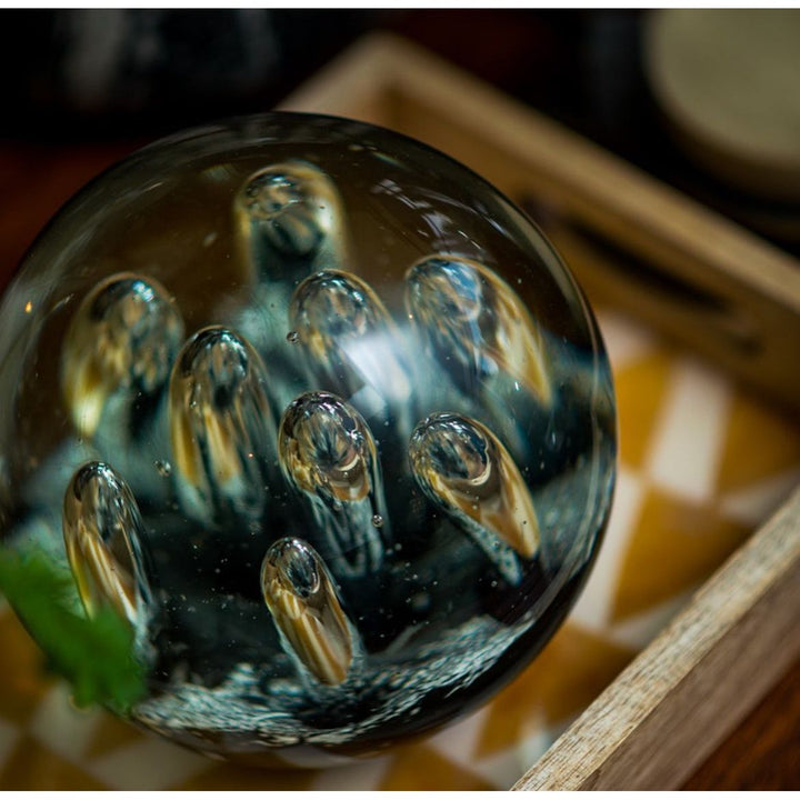 Glass Paperweight with Black Sand Design